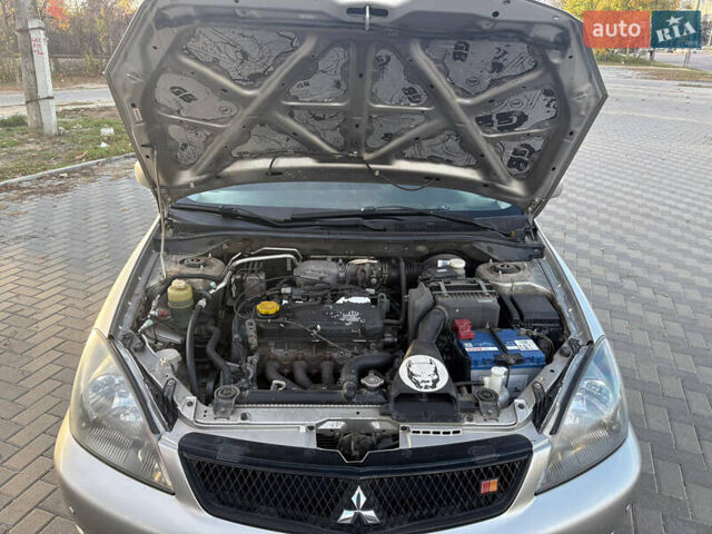 Сірий Міцубісі Lancer, об'ємом двигуна 2 л та пробігом 180 тис. км за 4000 $, фото 16 на Automoto.ua