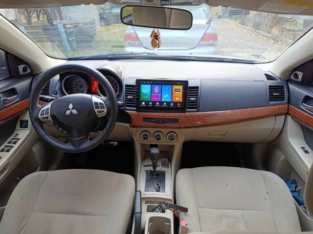 Сірий Міцубісі Lancer, об'ємом двигуна 1.5 л та пробігом 268 тис. км за 5935 $, фото 7 на Automoto.ua
