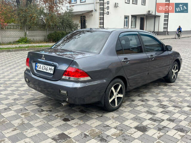 Міцубісі Lancer 2007 у Белой Церкве на Automoto.ua Сірий Міцубісі Lancer, об'ємом двигуна 1.58 л та пробігом 254 тис. км за 3200 $, фото 4 на Automoto.ua