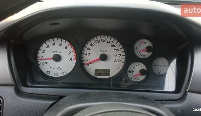 Міцубісі Lancer 2007 у Хмельницькому на Automoto.ua Сірий Міцубісі Lancer, об'ємом двигуна 1.58 л та пробігом 143 тис. км за 4100 $, фото 9 на Automoto.ua