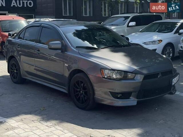 Сірий Міцубісі Lancer, об'ємом двигуна 2 л та пробігом 203 тис. км за 6999 $, фото 6 на Automoto.ua
