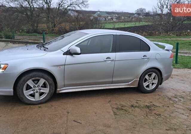 Сірий Міцубісі Lancer, об'ємом двигуна 2 л та пробігом 226 тис. км за 5999 $, фото 2 на Automoto.ua