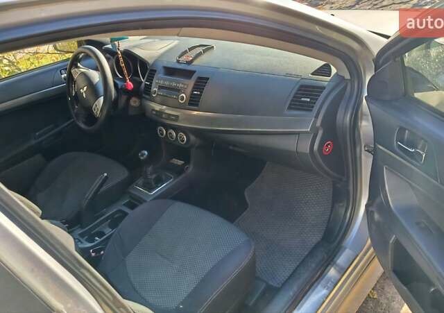 Мицубиси Лансер 2007 в Кропивницком (Кировограде) на Automoto.ua Серый Мицубиси Лансер, объемом двигателя 2 л и пробегом 230 тыс. км за 6600 $, фото 1 на Automoto.ua