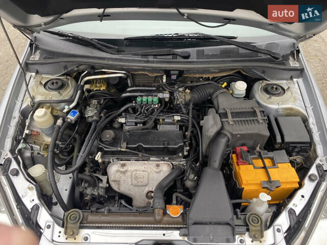 Серый Мицубиси Лансер, объемом двигателя 1.58 л и пробегом 240 тыс. км за 5500 $, фото 4 на Automoto.ua