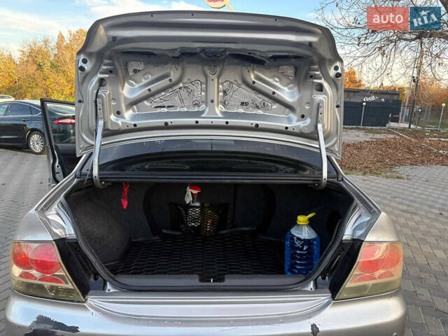 Серый Мицубиси Лансер, объемом двигателя 2 л и пробегом 184 тыс. км за 4900 $, фото 7 на Automoto.ua