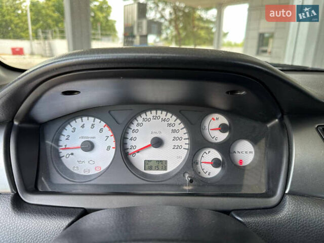 Сірий Міцубісі Lancer, об'ємом двигуна 1.58 л та пробігом 181 тис. км за 5699 $, фото 33 на Automoto.ua