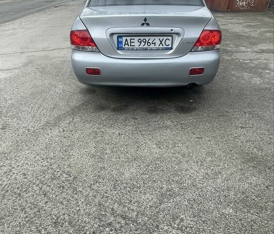 Сірий Міцубісі Lancer, об'ємом двигуна 1.6 л та пробігом 200 тис. км за 4200 $, фото 1 на Automoto.ua