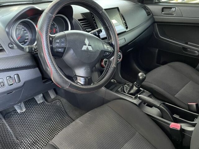 Серый Мицубиси Лансер, объемом двигателя 2 л и пробегом 244 тыс. км за 6500 $, фото 5 на Automoto.ua