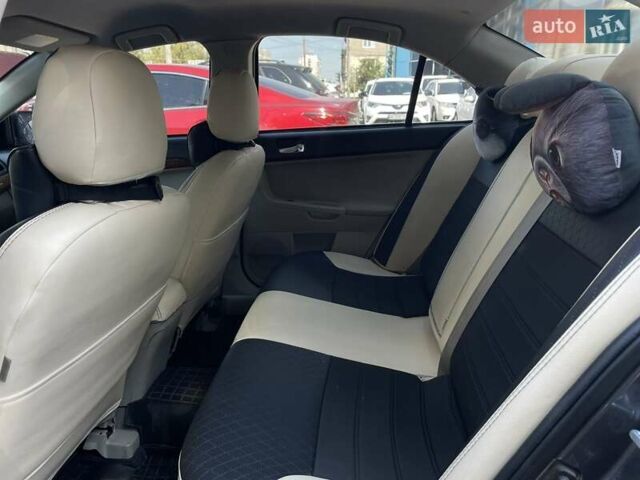 Сірий Міцубісі Lancer, об'ємом двигуна 2 л та пробігом 203 тис. км за 6999 $, фото 22 на Automoto.ua