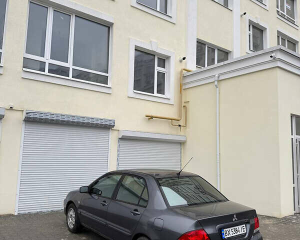 Серый Мицубиси Лансер, объемом двигателя 1.58 л и пробегом 187 тыс. км за 4800 $, фото 8 на Automoto.ua