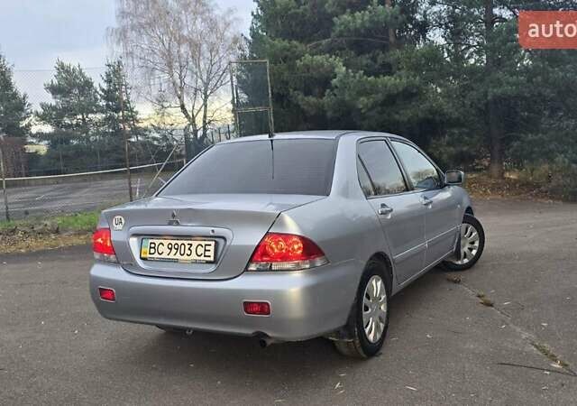 Сірий Міцубісі Lancer, об'ємом двигуна 1.6 л та пробігом 213 тис. км за 3600 $, фото 5 на Automoto.ua