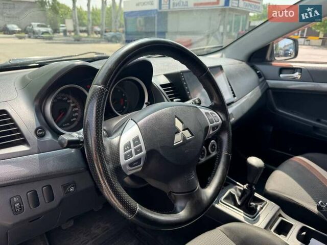Сірий Міцубісі Lancer, об'ємом двигуна 2 л та пробігом 149 тис. км за 6798 $, фото 20 на Automoto.ua