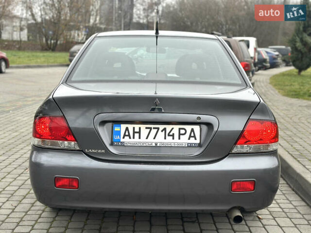 Сірий Міцубісі Lancer, об'ємом двигуна 1.6 л та пробігом 177 тис. км за 2800 $, фото 5 на Automoto.ua