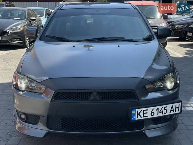 Сірий Міцубісі Lancer, об'ємом двигуна 2 л та пробігом 203 тис. км за 6999 $, фото 1 на Automoto.ua