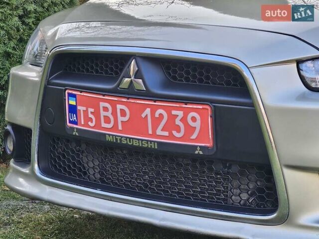 Серый Мицубиси Лансер, объемом двигателя 2 л и пробегом 282 тыс. км за 5450 $, фото 26 на Automoto.ua