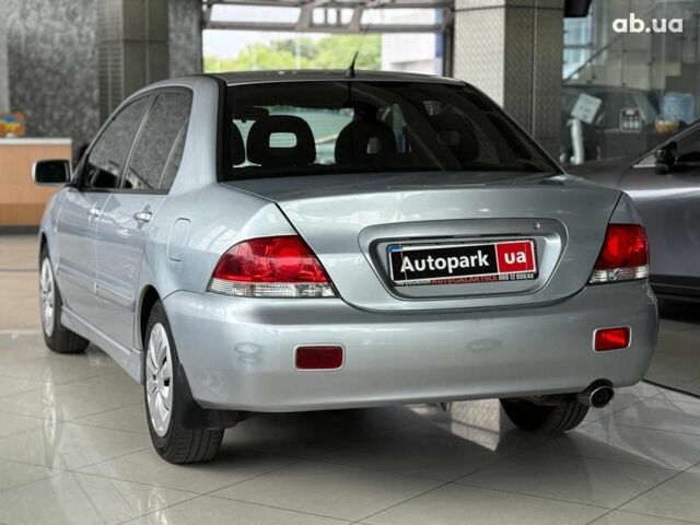 Серый Мицубиси Лансер, объемом двигателя 1.6 л и пробегом 174 тыс. км за 5990 $, фото 6 на Automoto.ua