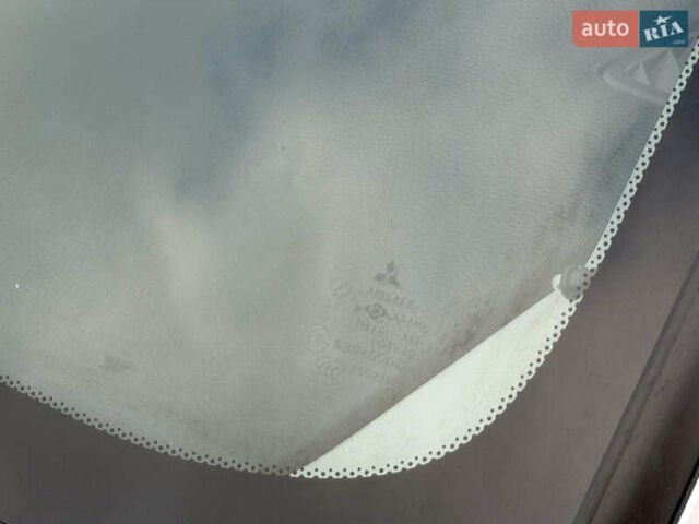 Серый Мицубиси Лансер, объемом двигателя 1.3 л и пробегом 160 тыс. км за 5555 $, фото 29 на Automoto.ua