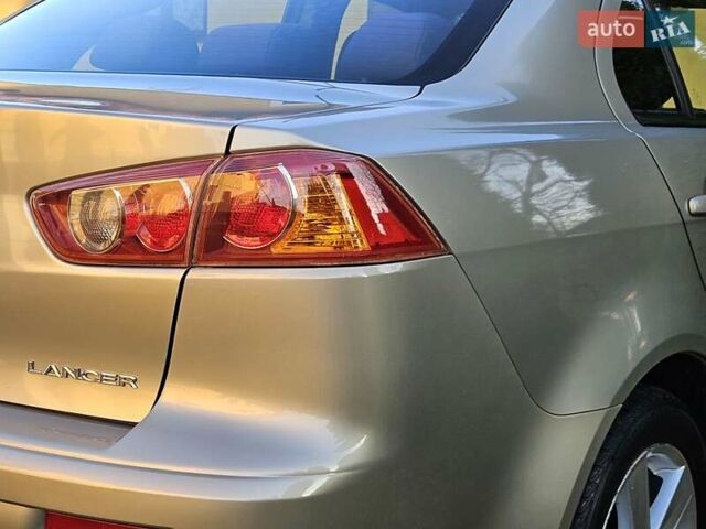 Серый Мицубиси Лансер, объемом двигателя 2 л и пробегом 282 тыс. км за 5450 $, фото 37 на Automoto.ua