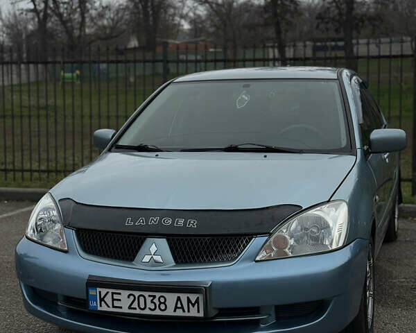 Серый Мицубиси Лансер, объемом двигателя 1.6 л и пробегом 238 тыс. км за 4400 $, фото 3 на Automoto.ua