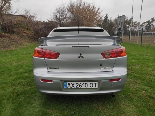 Серый Мицубиси Лансер, объемом двигателя 2 л и пробегом 124 тыс. км за 7499 $, фото 3 на Automoto.ua