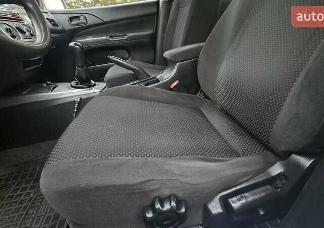 Сірий Міцубісі Lancer, об'ємом двигуна 1.6 л та пробігом 213 тис. км за 3600 $, фото 21 на Automoto.ua