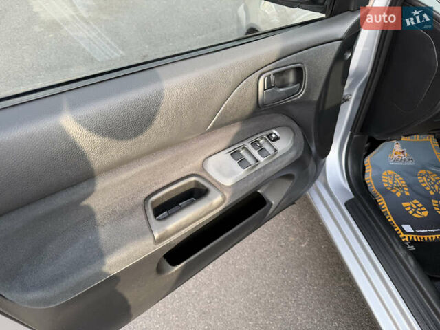 Сірий Міцубісі Lancer, об'ємом двигуна 1.3 л та пробігом 160 тис. км за 4999 $, фото 36 на Automoto.ua