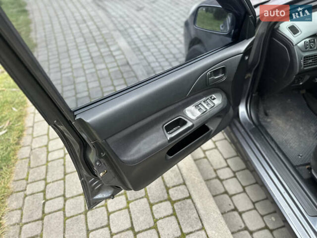 Сірий Міцубісі Lancer, об'ємом двигуна 1.6 л та пробігом 177 тис. км за 2800 $, фото 18 на Automoto.ua