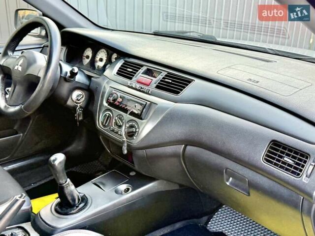Сірий Міцубісі Lancer, об'ємом двигуна 1.6 л та пробігом 395 тис. км за 4900 $, фото 19 на Automoto.ua