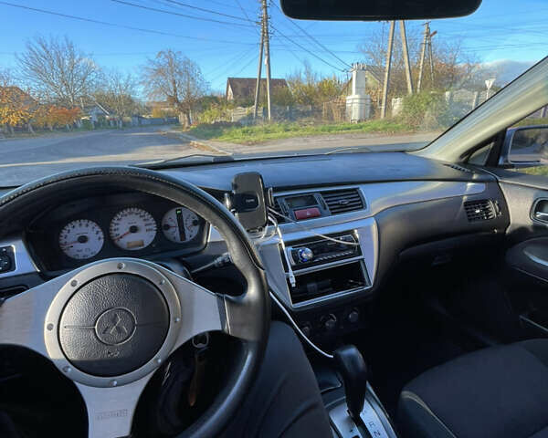 Мицубиси Лансер 2007 в Василькове на Automoto.ua Серый Мицубиси Лансер, объемом двигателя 2 л и пробегом 177 тыс. км за 5399 $, фото 17 на Automoto.ua