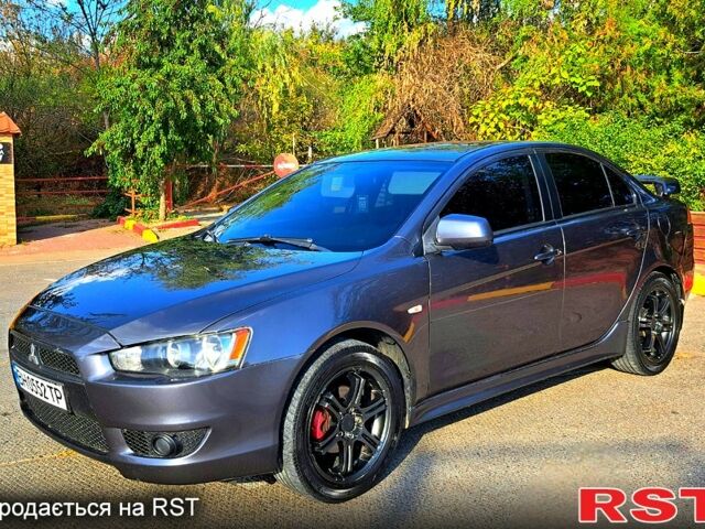 Сірий Міцубісі Lancer, об'ємом двигуна 2 л та пробігом 215 тис. км за 7300 $, фото 5 на Automoto.ua