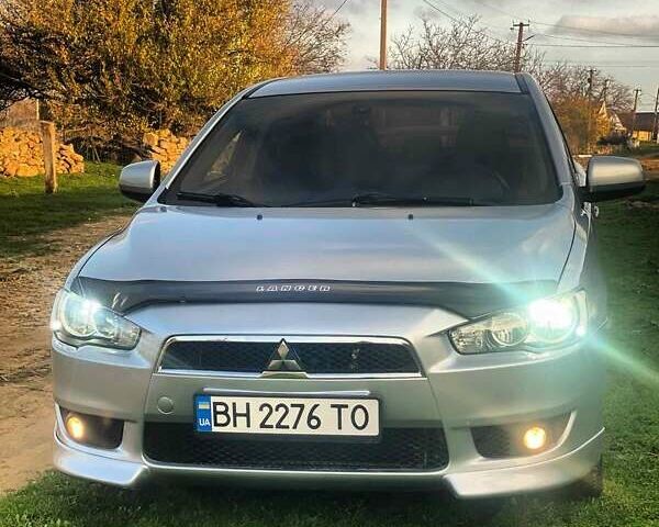 Серый Мицубиси Лансер, объемом двигателя 2 л и пробегом 226 тыс. км за 6200 $, фото 2 на Automoto.ua