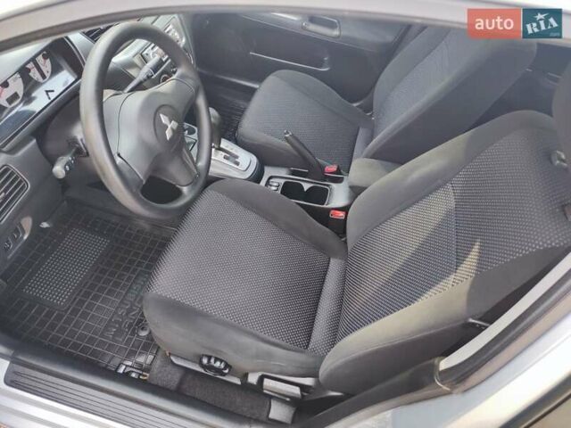 Сірий Міцубісі Lancer, об'ємом двигуна 1.58 л та пробігом 122 тис. км за 6300 $, фото 31 на Automoto.ua