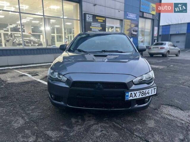 Серый Мицубиси Лансер, объемом двигателя 2 л и пробегом 170 тыс. км за 6999 $, фото 2 на Automoto.ua