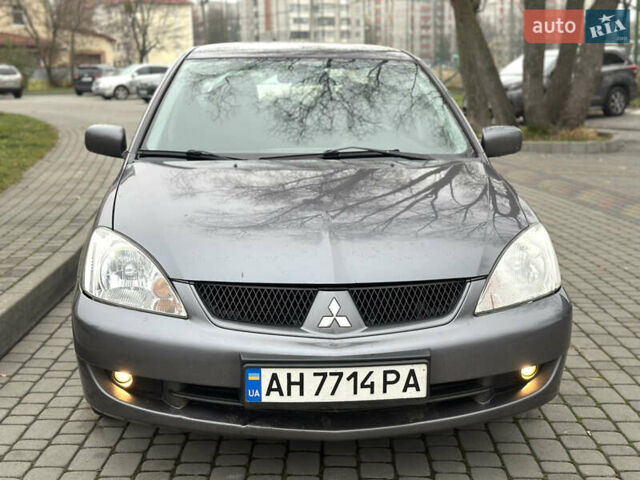 Сірий Міцубісі Lancer, об'ємом двигуна 1.6 л та пробігом 177 тис. км за 2800 $, фото 16 на Automoto.ua