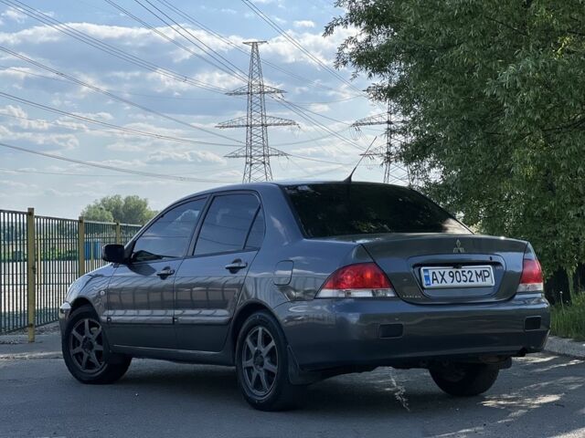 Сірий Міцубісі Lancer, об'ємом двигуна 0.16 л та пробігом 250 тис. км за 4350 $, фото 4 на Automoto.ua