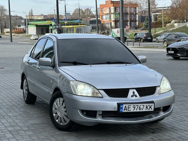 Сірий Міцубісі Lancer, об'ємом двигуна 1.6 л та пробігом 200 тис. км за 3900 $, фото 4 на Automoto.ua