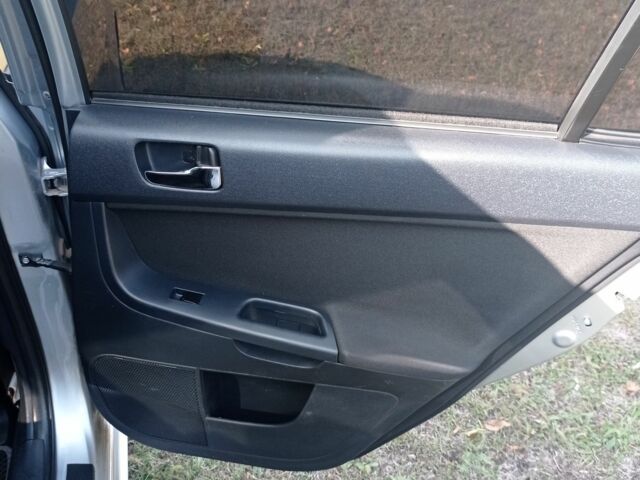 Серый Мицубиси Лансер, объемом двигателя 2 л и пробегом 180 тыс. км за 5800 $, фото 17 на Automoto.ua