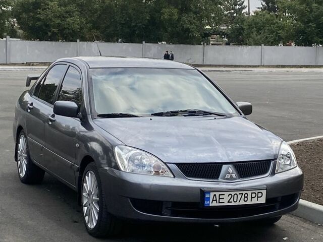 Серый Мицубиси Лансер, объемом двигателя 1.6 л и пробегом 250 тыс. км за 3999 $, фото 18 на Automoto.ua
