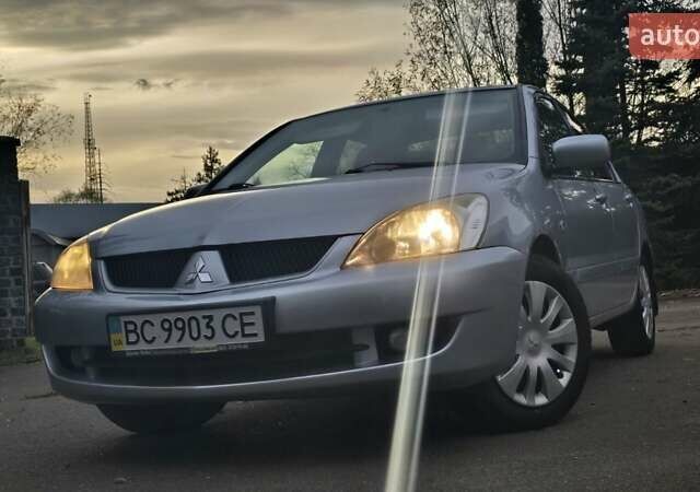 Сірий Міцубісі Lancer, об'ємом двигуна 1.6 л та пробігом 213 тис. км за 3600 $, фото 2 на Automoto.ua