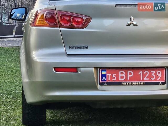 Серый Мицубиси Лансер, объемом двигателя 2 л и пробегом 282 тыс. км за 5450 $, фото 32 на Automoto.ua