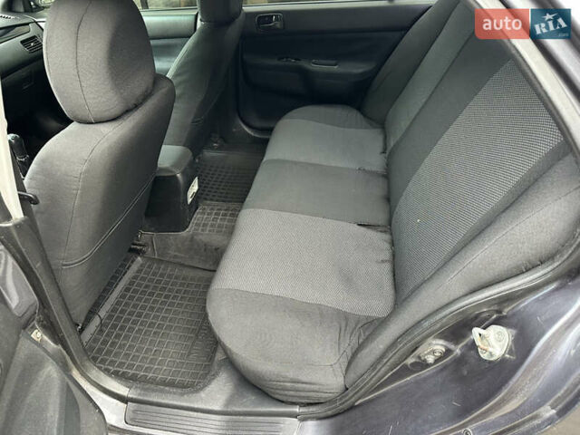 Сірий Міцубісі Lancer, об'ємом двигуна 1.6 л та пробігом 115 тис. км за 2800 $, фото 12 на Automoto.ua