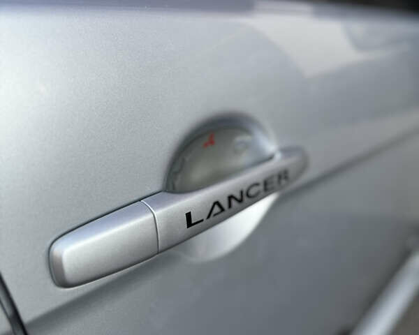 Сірий Міцубісі Lancer, об'ємом двигуна 2 л та пробігом 173 тис. км за 6800 $, фото 16 на Automoto.ua