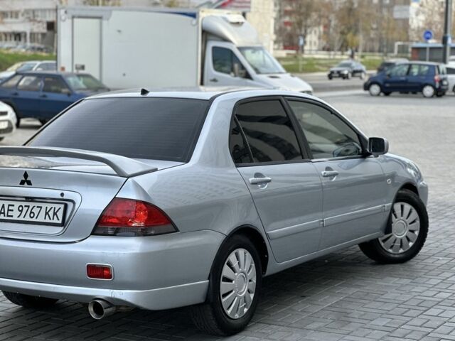 Сірий Міцубісі Lancer, об'ємом двигуна 1.6 л та пробігом 200 тис. км за 3900 $, фото 1 на Automoto.ua