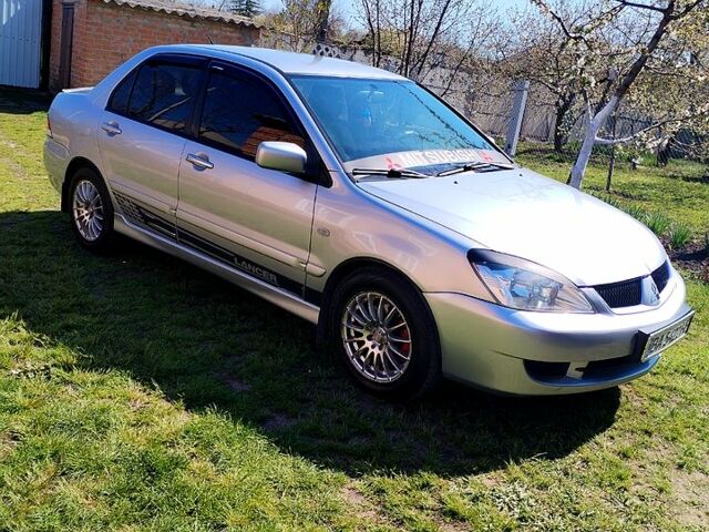Сірий Міцубісі Lancer, об'ємом двигуна 1.6 л та пробігом 280 тис. км за 4800 $, фото 5 на Automoto.ua