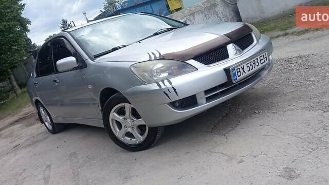 Сірий Міцубісі Lancer, об'ємом двигуна 1.6 л та пробігом 298 тис. км за 4100 $, фото 72 на Automoto.ua