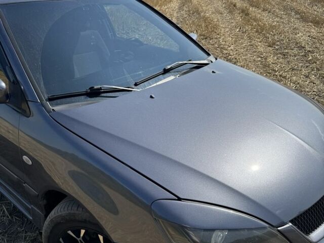 Серый Мицубиси Лансер, объемом двигателя 1.6 л и пробегом 280 тыс. км за 4000 $, фото 4 на Automoto.ua