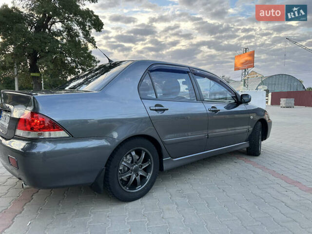 Сірий Міцубісі Lancer, об'ємом двигуна 1.6 л та пробігом 189 тис. км за 6200 $, фото 5 на Automoto.ua