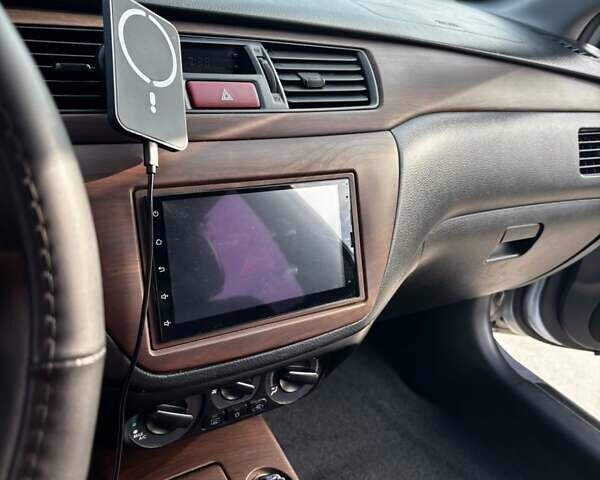 Серый Мицубиси Лансер, объемом двигателя 1.6 л и пробегом 180 тыс. км за 4200 $, фото 19 на Automoto.ua