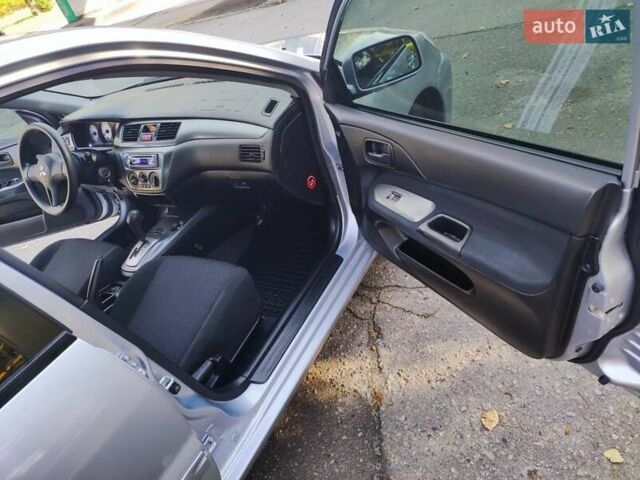 Сірий Міцубісі Lancer, об'ємом двигуна 1.58 л та пробігом 122 тис. км за 6300 $, фото 32 на Automoto.ua