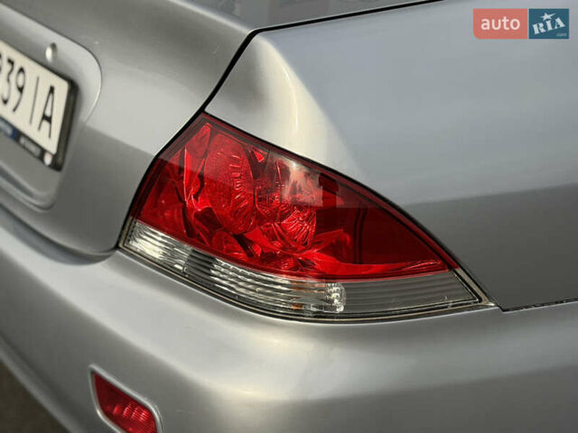 Серый Мицубиси Лансер, объемом двигателя 1.3 л и пробегом 160 тыс. км за 5555 $, фото 28 на Automoto.ua